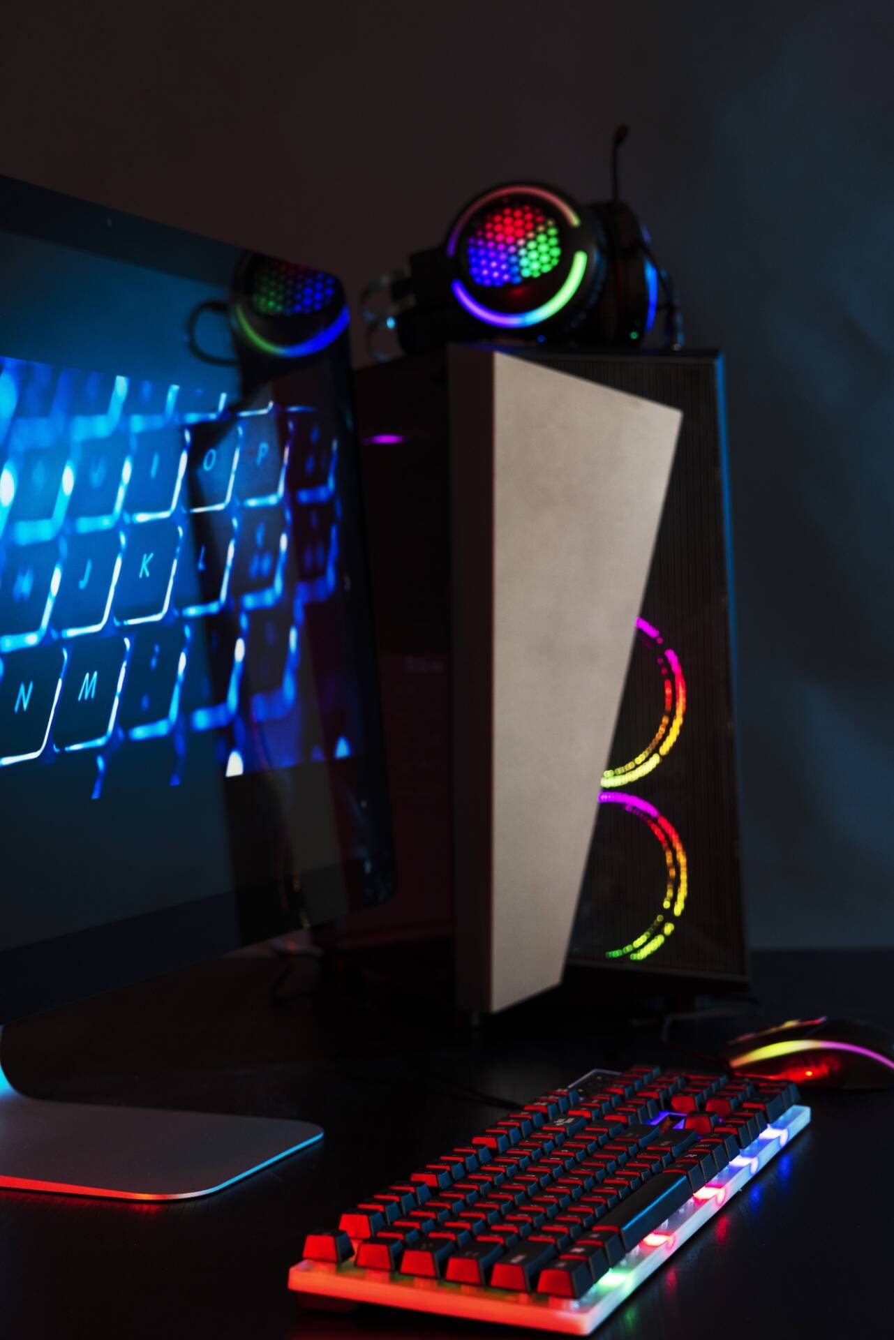 gradient-view-illuminated-neon-gaming-desk-setup-with-keyboard